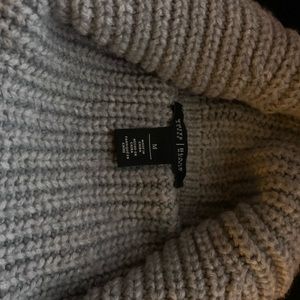 Cowl neck sweater and matching vest.